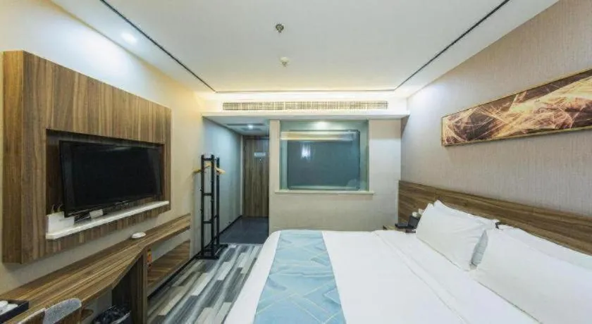 Bed in Borrman Hotel Zhenjiang Dashikou Suning Plaza