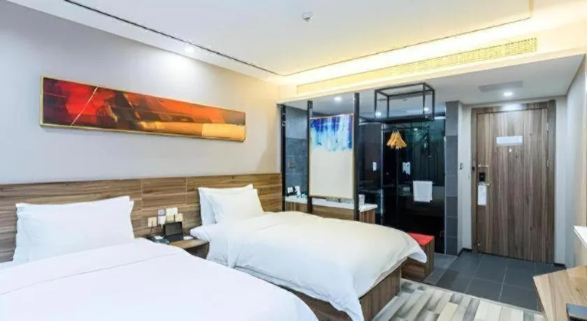 Bed in Borrman Hotel Zhenjiang Dashikou Suning Plaza