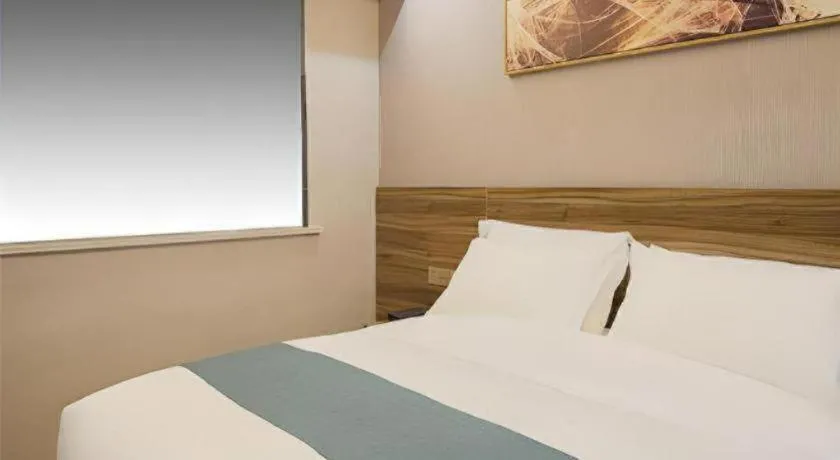 Bed in Borrman Hotel Zhenjiang Dashikou Suning Plaza