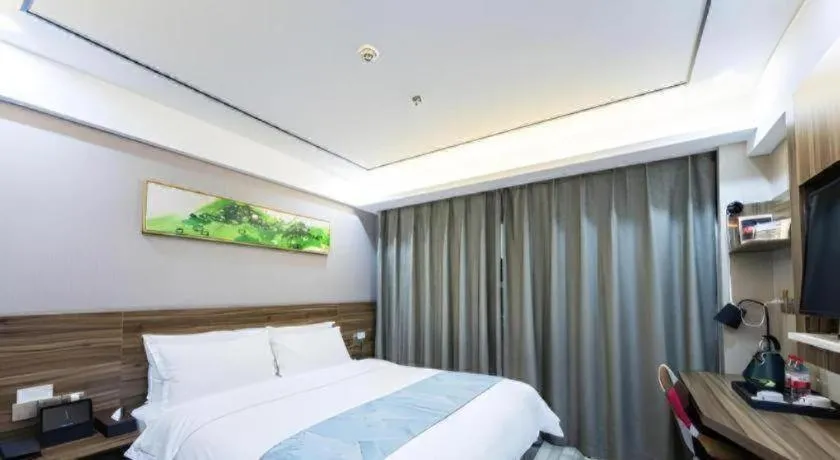Bed in Borrman Hotel Zhenjiang Dashikou Suning Plaza