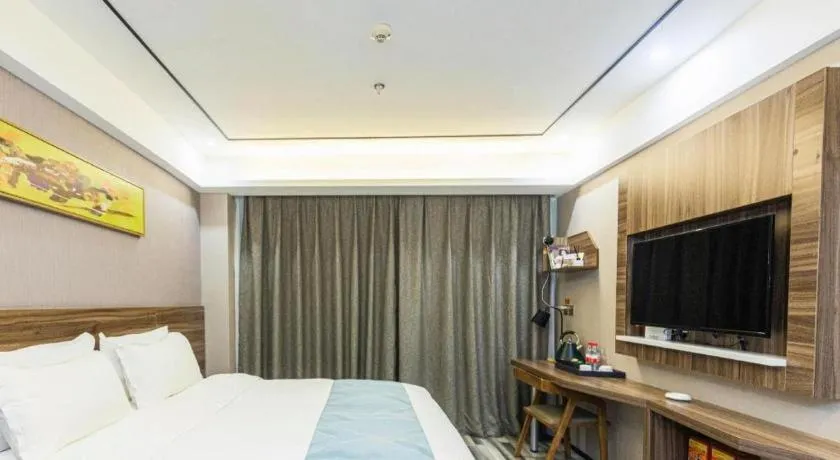Bed in Borrman Hotel Zhenjiang Dashikou Suning Plaza