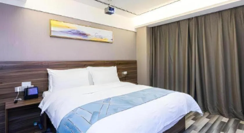 Bed in Borrman Hotel Zhenjiang Dashikou Suning Plaza