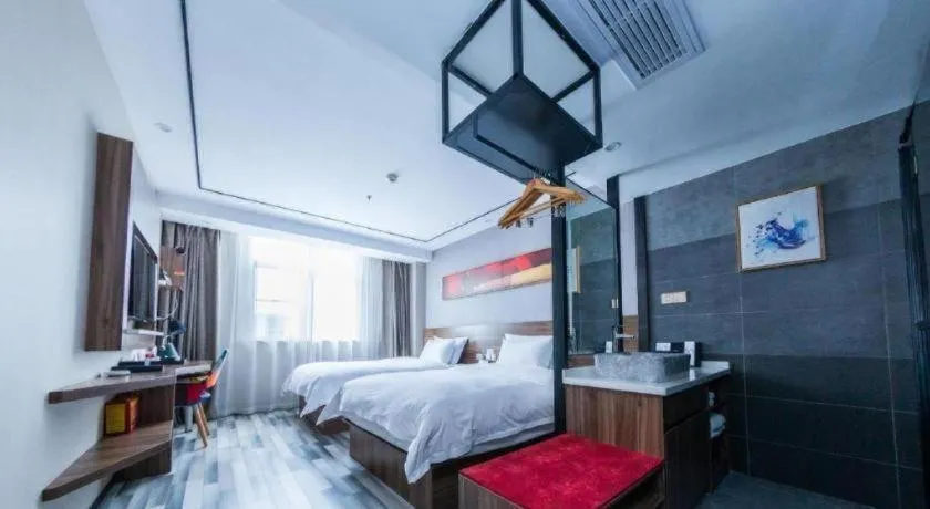 Bed in Borrman Hotel Zhenjiang Dashikou Suning Plaza