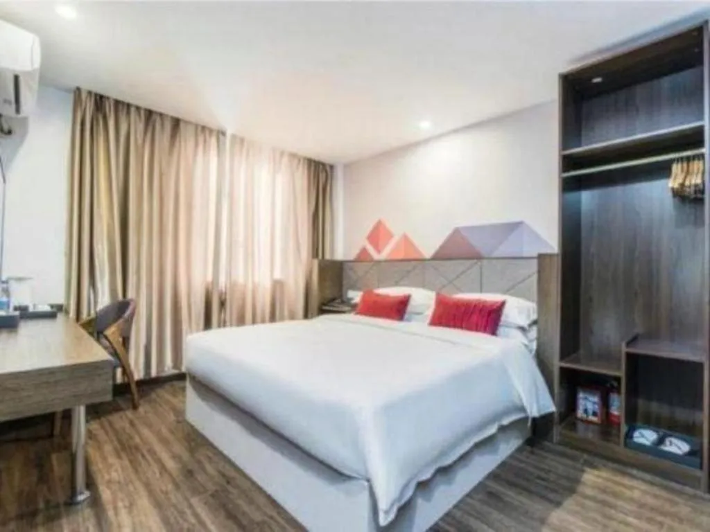Bed in Borrman Hotel Wuxi Hubin Business Street