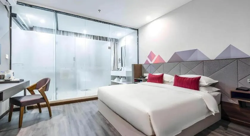 Bed in Borrman Hotel Wuxi Hubin Business Street