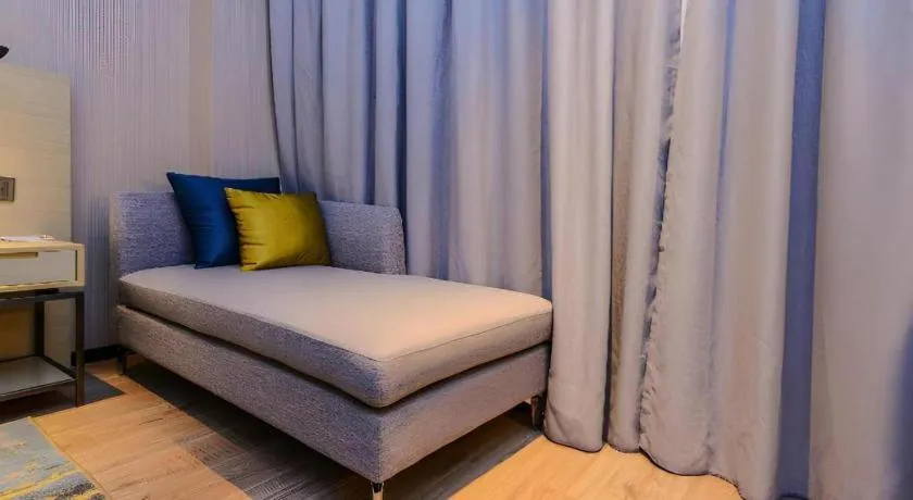 Bed in Echarm Hotel Guizhou Xingyi Jushan Avenue