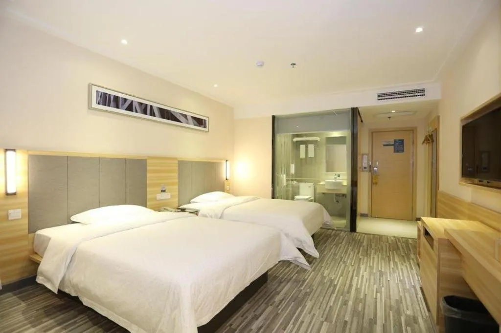 Bed in City Comfort Inn Hotel Zhangjiajie Railway Station Tianmen Mountain Cableway Station