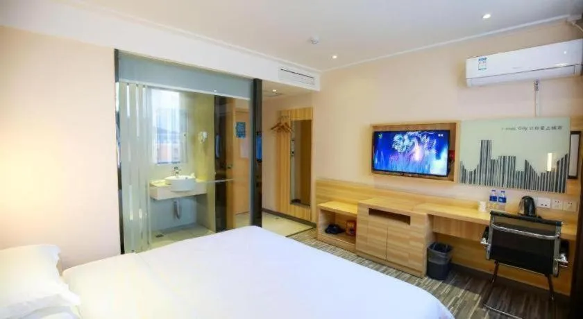 Bed in City Comfort Inn Hotel Zhangjiajie Railway Station Tianmen Mountain Cableway Station