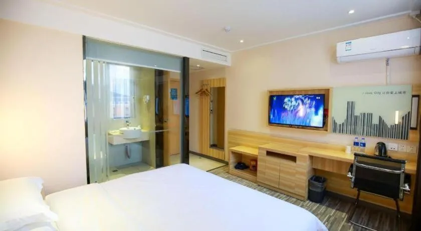 Bed in City Comfort Inn Hotel Zhangjiajie Railway Station Tianmen Mountain Cableway Station