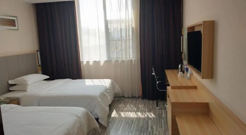 Bed in City Comfort Inn Hotel Zhangjiajie Railway Station Tianmen Mountain Cableway Station