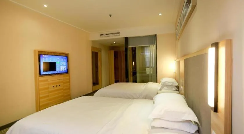 Bed in City Comfort Inn Hotel Zhangjiajie Railway Station Tianmen Mountain Cableway Station