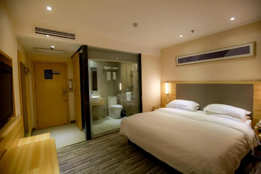 Bed in City Comfort Inn Hotel Zhangjiajie Railway Station Tianmen Mountain Cableway Station