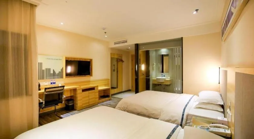 Bed in City Comfort Inn Hotel Zhangjiajie Railway Station Tianmen Mountain Cableway Station