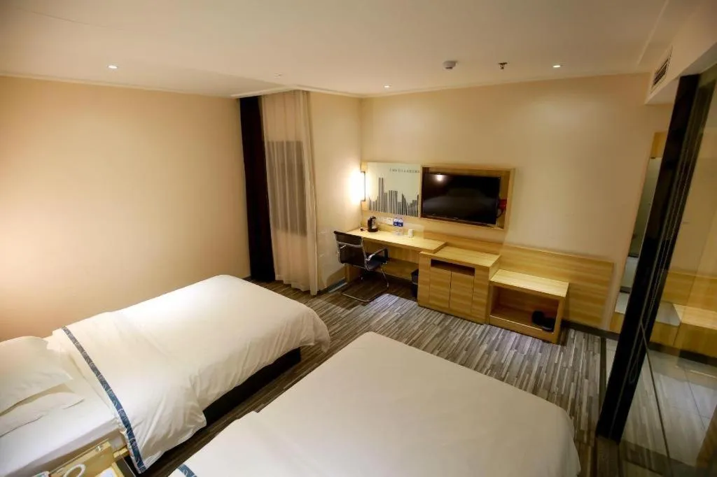 Bed in City Comfort Inn Hotel Zhangjiajie Railway Station Tianmen Mountain Cableway Station