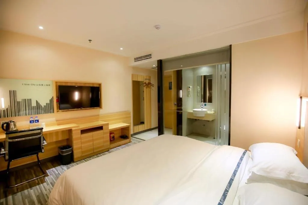 Bed in City Comfort Inn Hotel Zhangjiajie Railway Station Tianmen Mountain Cableway Station