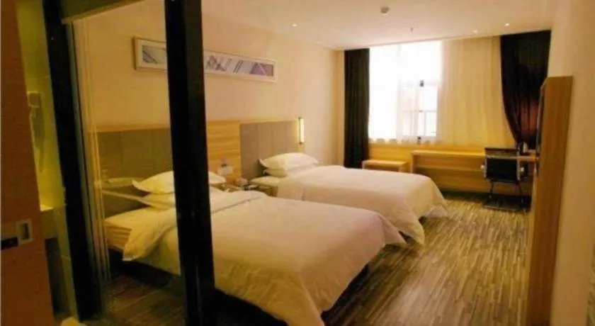 Bed in City Comfort Inn Hotel Zhangjiajie Railway Station Tianmen Mountain Cableway Station