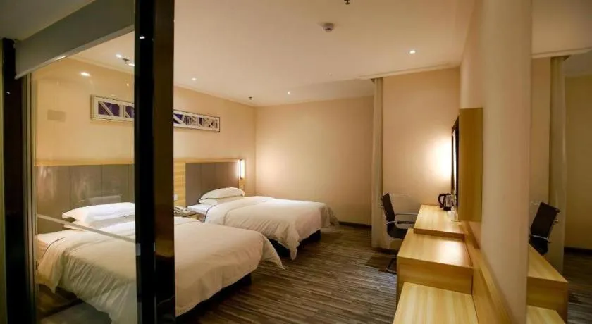 Bed in City Comfort Inn Hotel Zhangjiajie Railway Station Tianmen Mountain Cableway Station