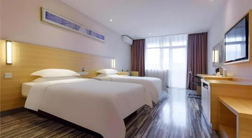 Bed in City Comfort Inn Hotel Guiyang Normal University Yangmingci Metro Station