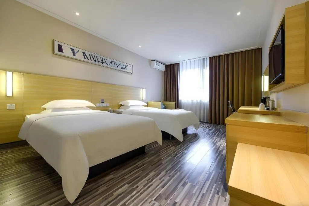 Bed in City Comfort Inn Hotel Guiyang Normal University Yangmingci Metro Station