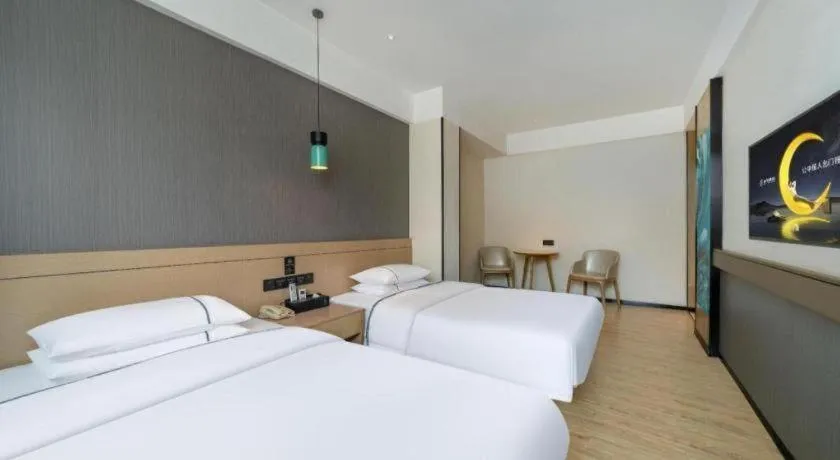 Bed in City Comfort Inn Hezhou Avenue