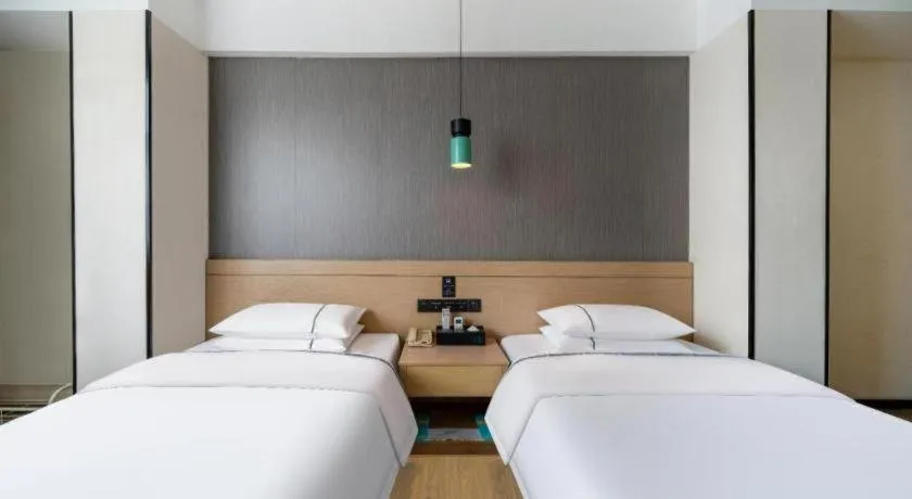 Bed in City Comfort Inn Hezhou Avenue