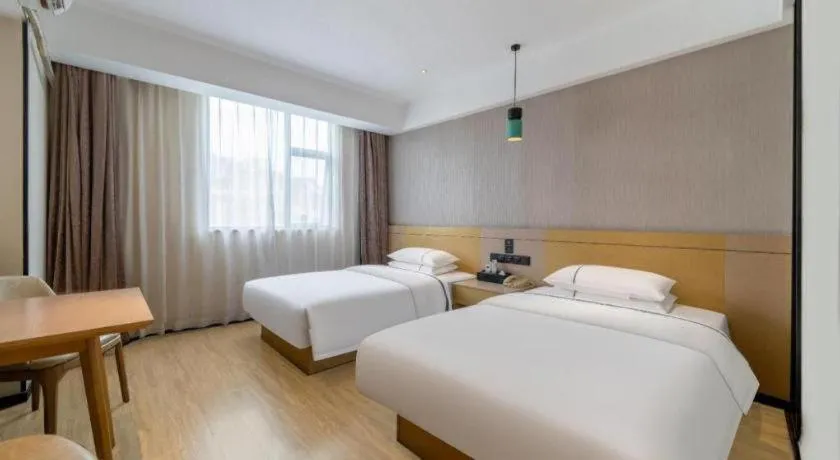 Bed in City Comfort Inn Hezhou Avenue