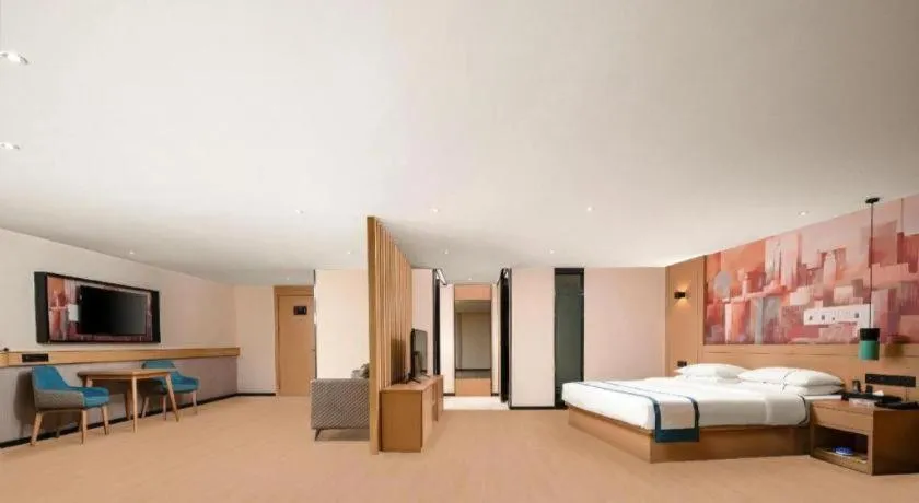 Bed in City Comfort Inn Yuzhou Yuwang Square