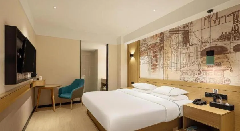 Bed in City Comfort Inn Yuzhou Yuwang Square