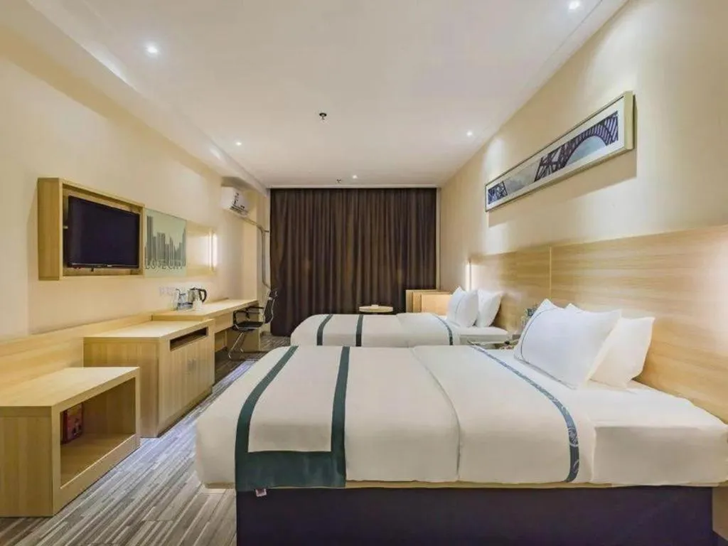 Bed in City Comfort Inn Dongguan Nancheng Tian'an Digital City