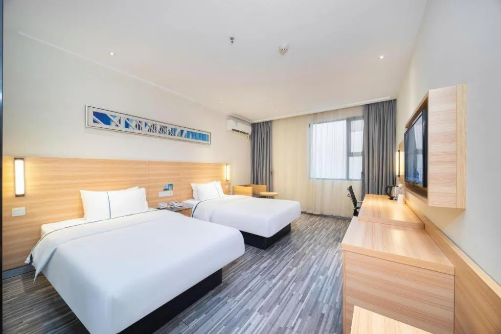 Bed in City Comfort Inn Wuhan Rui'an Street Metro Station