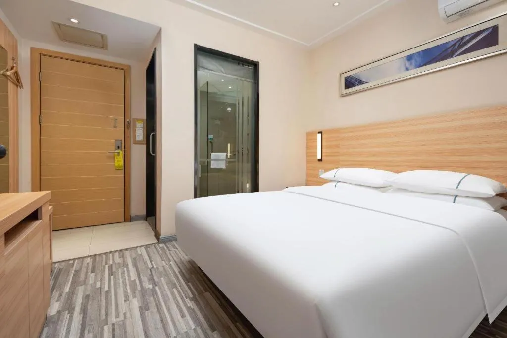 Bed in City Comfort Inn Wuhan Rui'an Street Metro Station