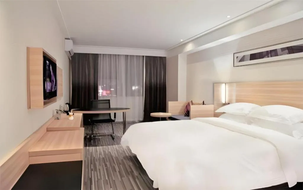 Bed in City Comfort Inn Wuhan Rui'an Street Metro Station