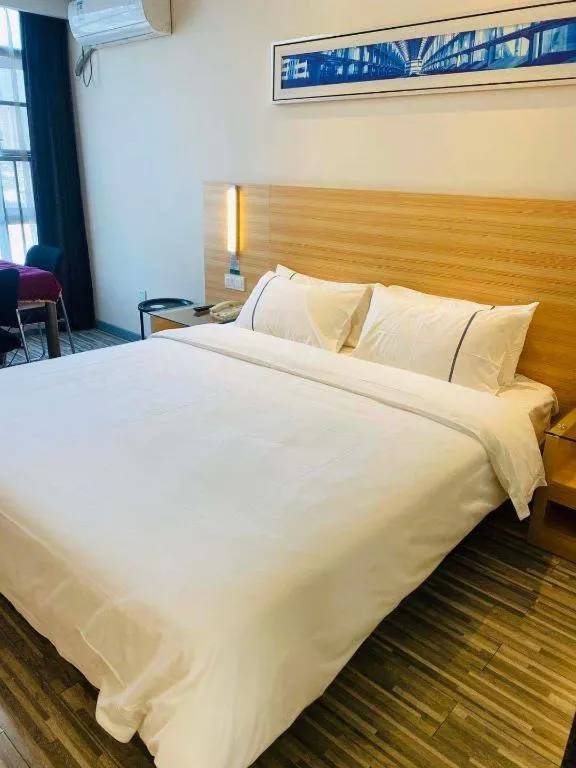 Bed in City Comfort Inn Wuhan Rui'an Street Metro Station