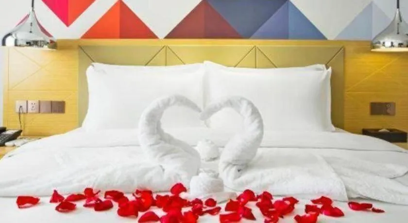 Bed in Borrman Hotel Zhuhai Gongbei Port Fuhuali Light Rail