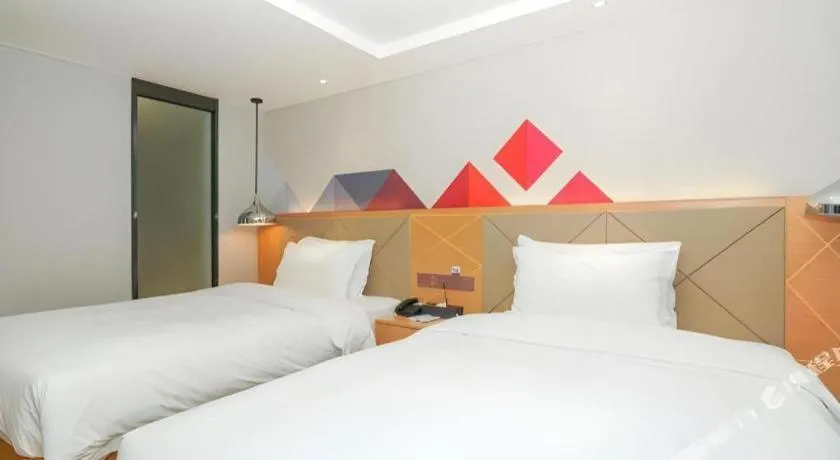 Bed in Borrman Hotel Zhuhai Gongbei Port Fuhuali Light Rail