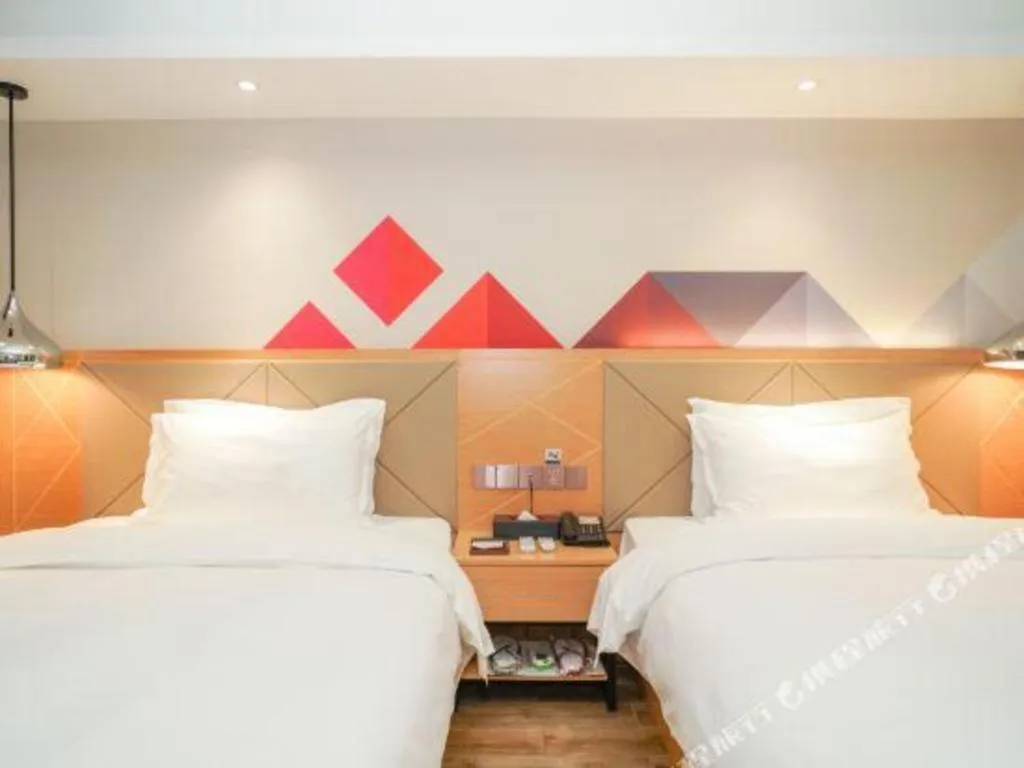 Bed in Borrman Hotel Zhuhai Gongbei Port Fuhuali Light Rail