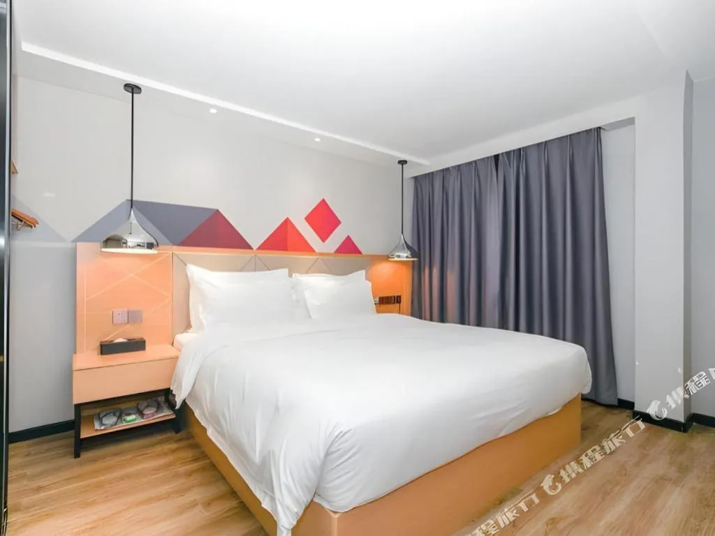 Bed in Borrman Hotel Zhuhai Gongbei Port Fuhuali Light Rail