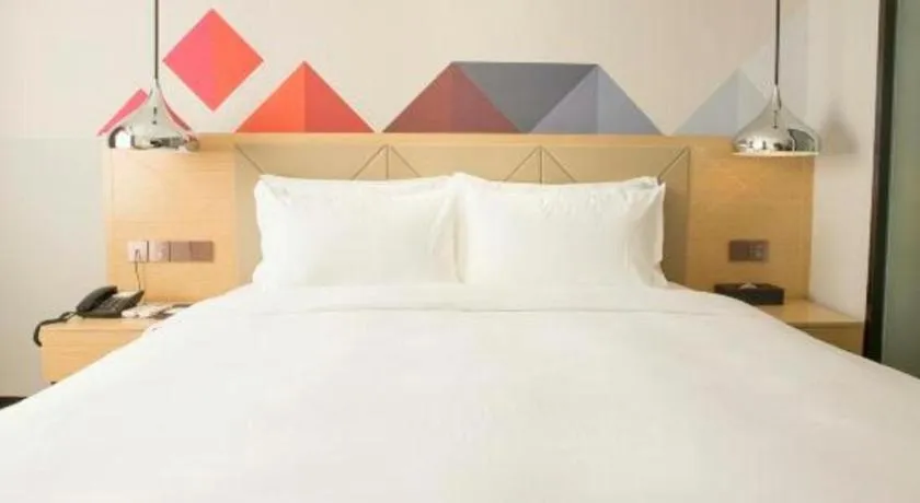 Bed in Borrman Hotel Zhuhai Gongbei Port Fuhuali Light Rail