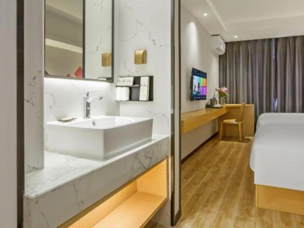 Bed in Borrman Hotel Zhuhai Gongbei Port Fuhuali Light Rail