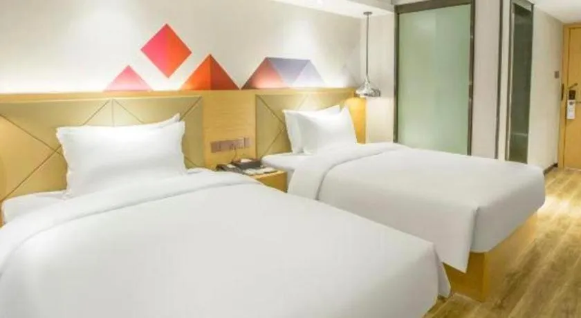 Bed in Borrman Hotel Zhuhai Gongbei Port Fuhuali Light Rail