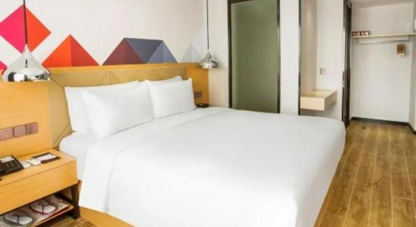 Bed in Borrman Hotel Zhuhai Gongbei Port Fuhuali Light Rail
