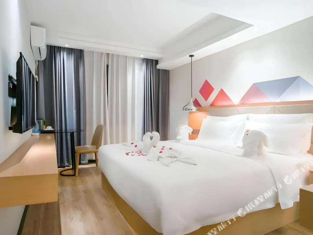 Bed in Borrman Hotel Zhuhai Gongbei Port Fuhuali Light Rail