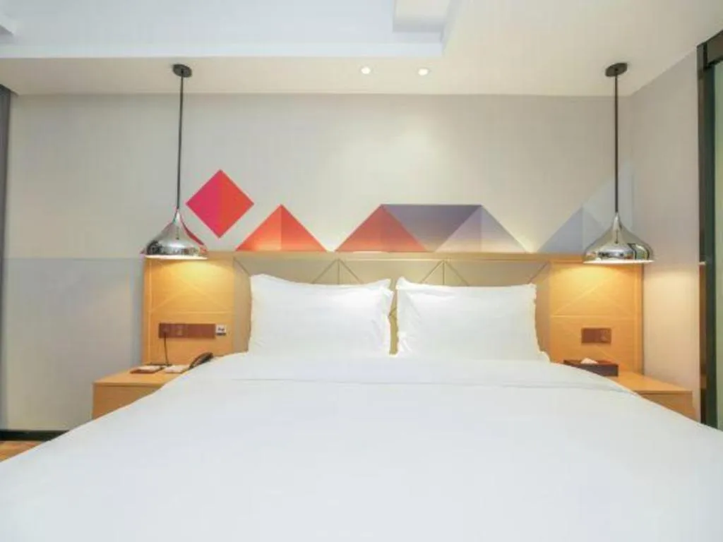 Bed in Borrman Hotel Zhuhai Gongbei Port Fuhuali Light Rail