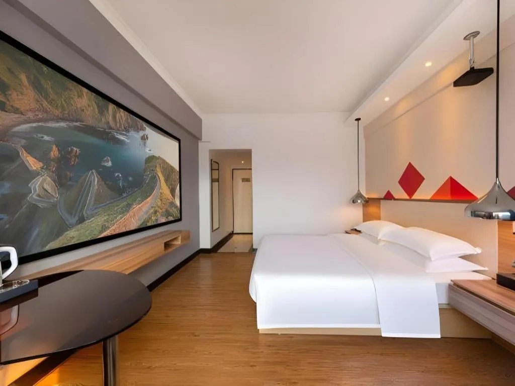 Bed in Borrman Hotel Zhuhai Gongbei Port Fuhuali Light Rail