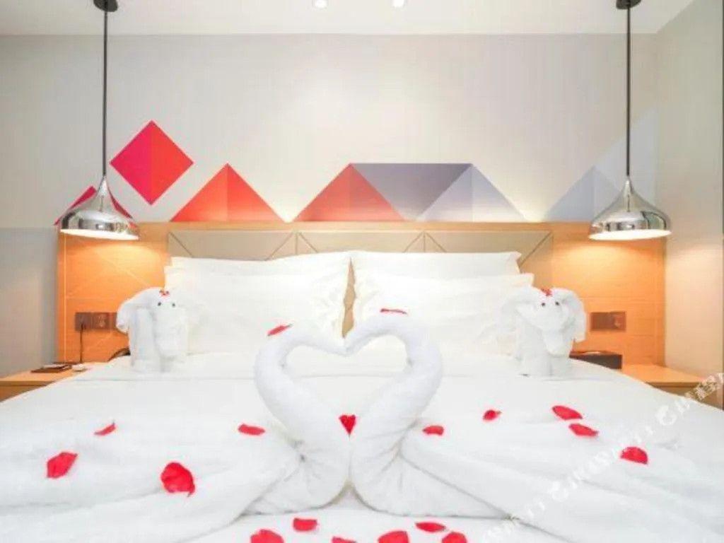 Bed in Borrman Hotel Zhuhai Gongbei Port Fuhuali Light Rail