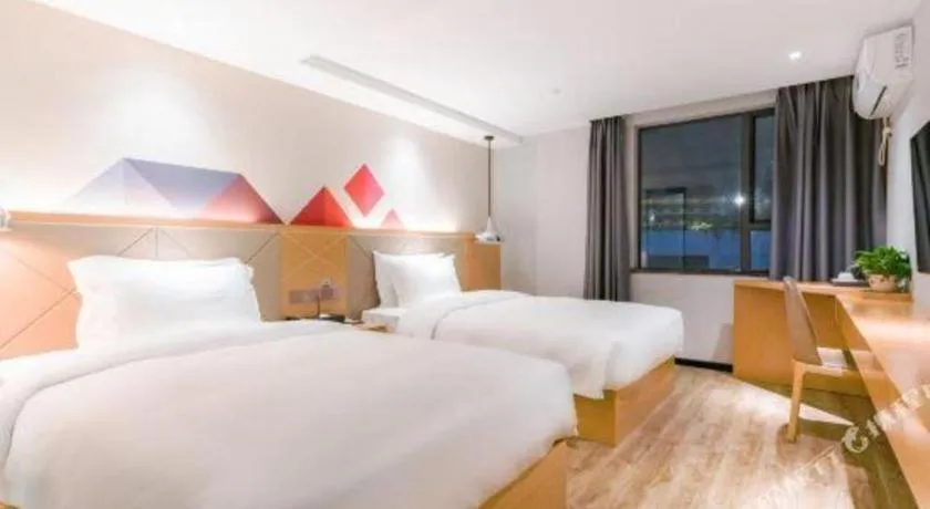 Bed in Borrman Hotel Zhuhai Gongbei Port Fuhuali Light Rail