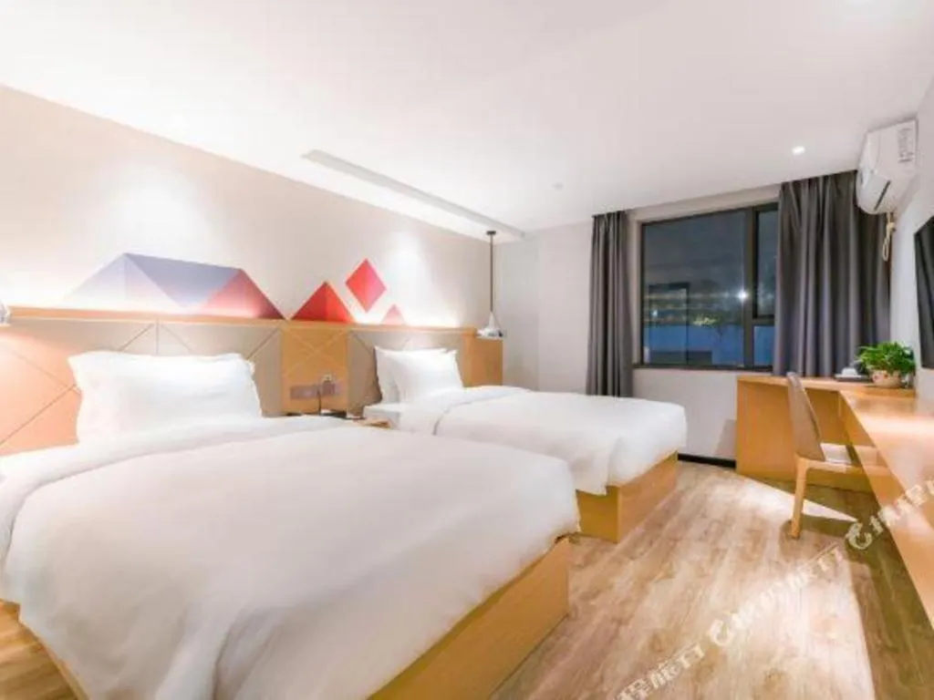 Bed in Borrman Hotel Zhuhai Gongbei Port Fuhuali Light Rail