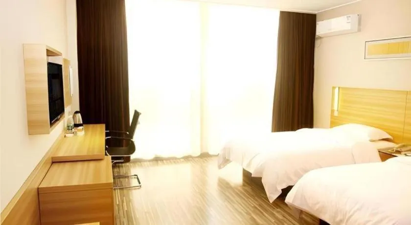Bed in City Comfort Inn Qianjiang Longxiacheng