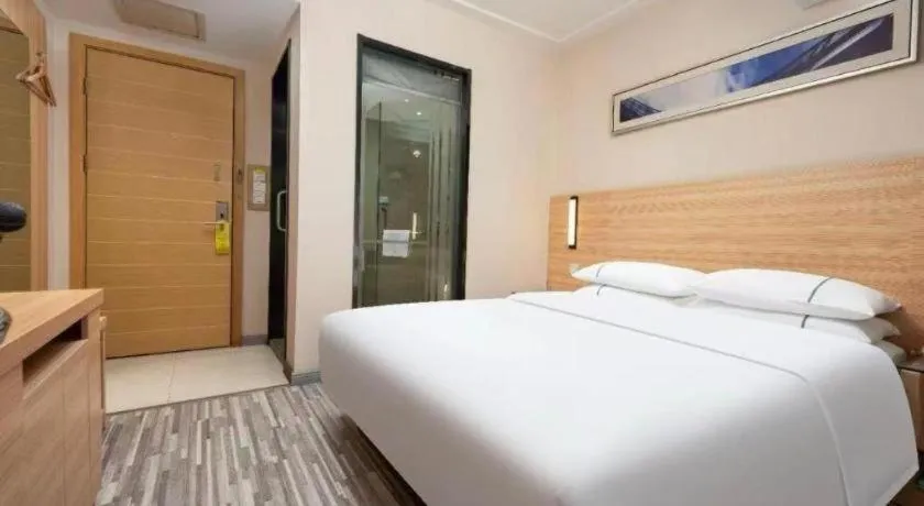 Bed in City Comfort Inn Qianjiang Longxiacheng