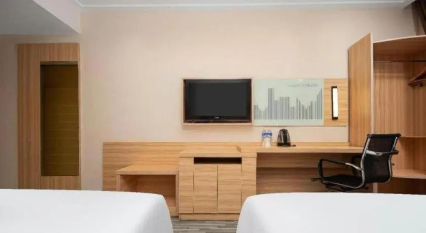 Bed in City Comfort Inn Qianjiang Longxiacheng